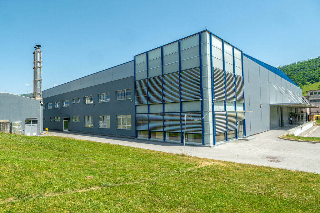 The exterior of a large industrial building