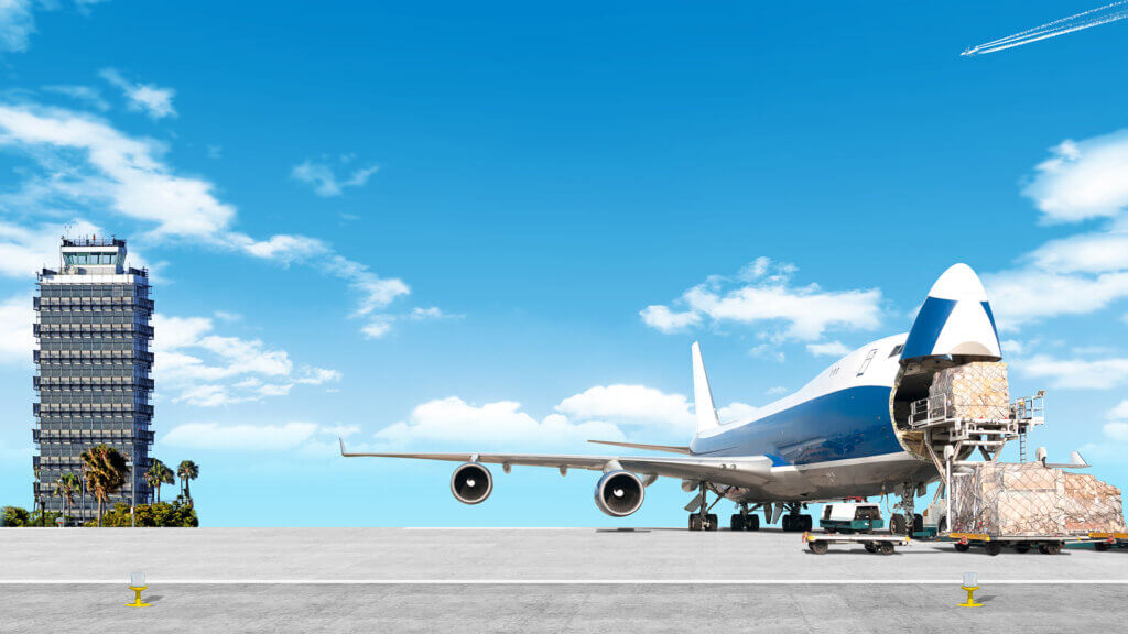 Cargo being unloaded from a plane that are being delivered using next flight out delivery services