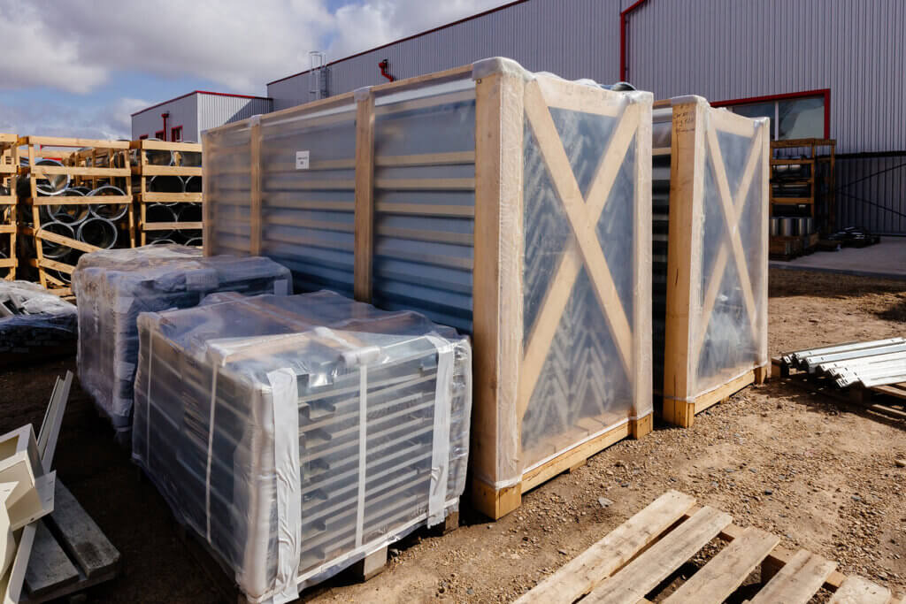 Palates of manufactured materials that have been delivered to a job site