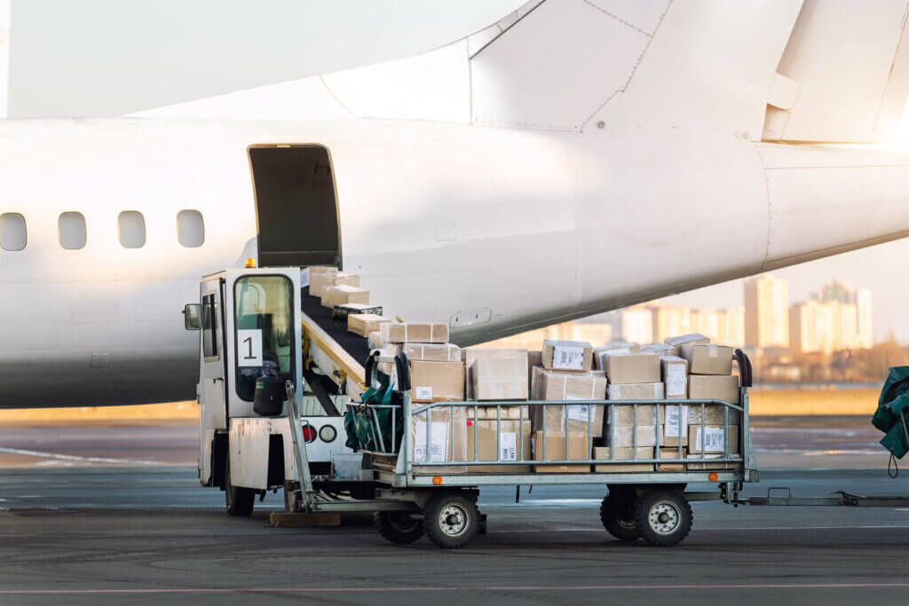 Packages being loaded onto a cargo plane for next flight out delivery services